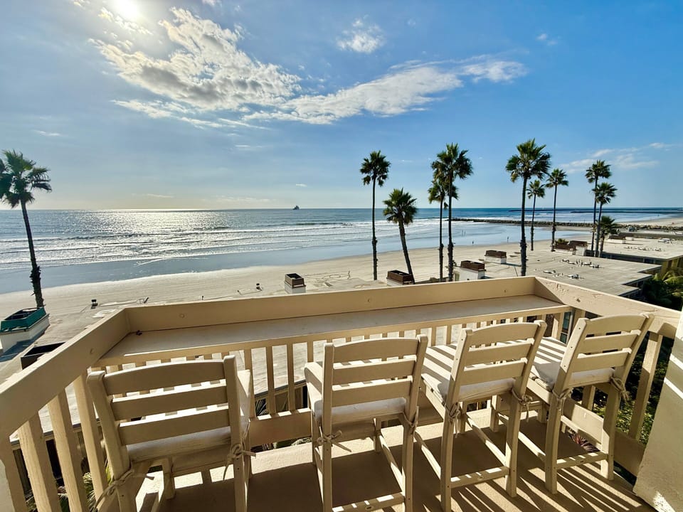 Enjoy sunset cocktails or your morning coffee at the patio bar overlooking the waves.