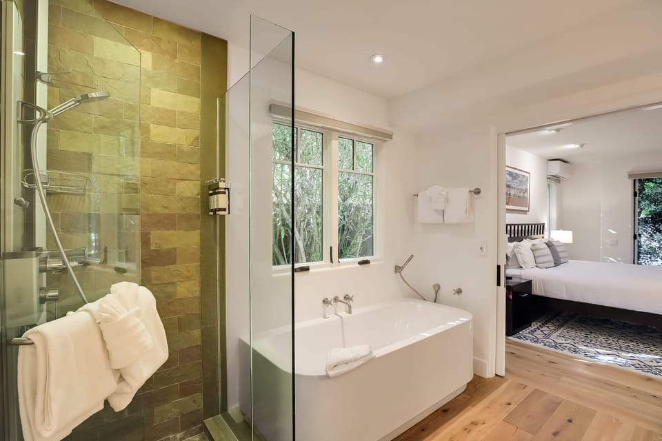 Separate soaking tub to relax in (downstairs primary).