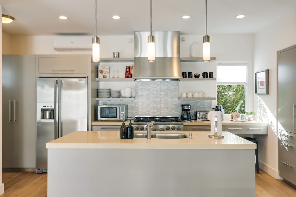 Enjoy cooking meals in this well equipped kitchen.
