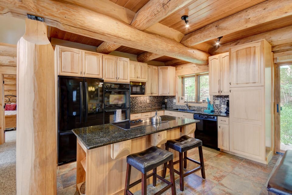 Kitchen Area with Extensive Wood Beams