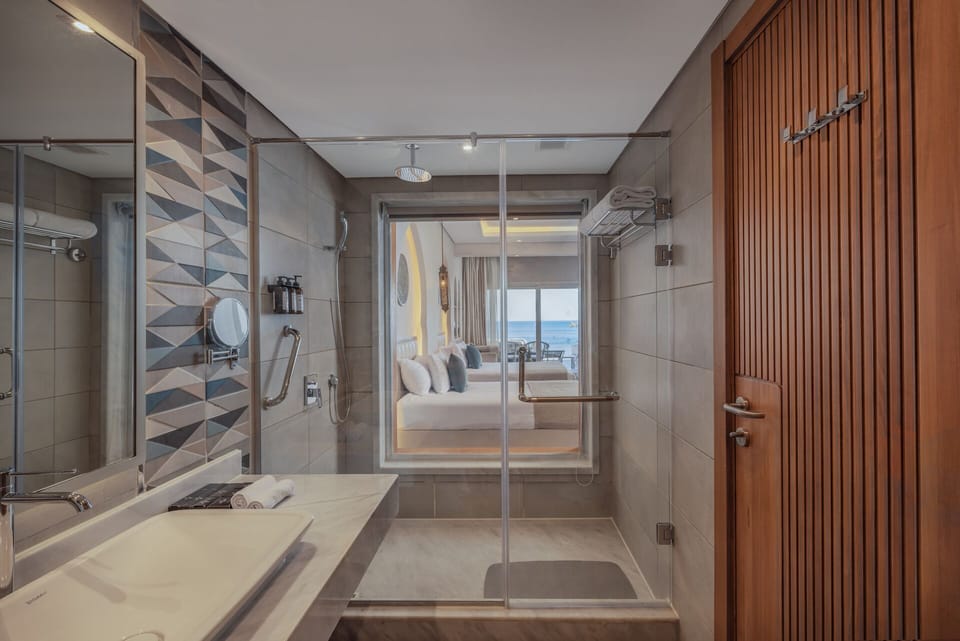 Shower, free toiletries, hair dryer, bathrobes