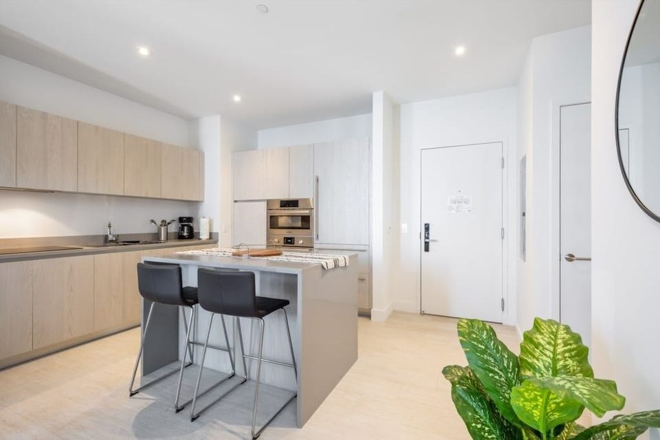 Condo, 2 Bedrooms | Private kitchen | Fridge, oven, coffee/tea maker