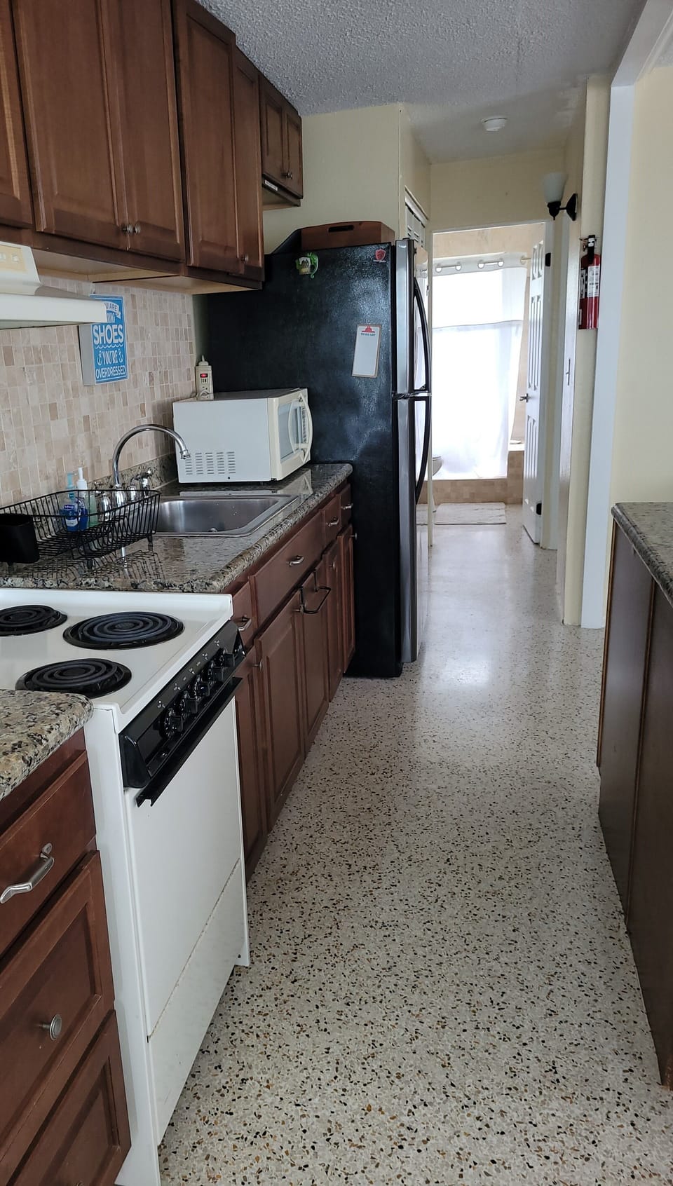 Fully quipped Kitchen with pots/pans, utensils, microwave. Dine out or stay in!
