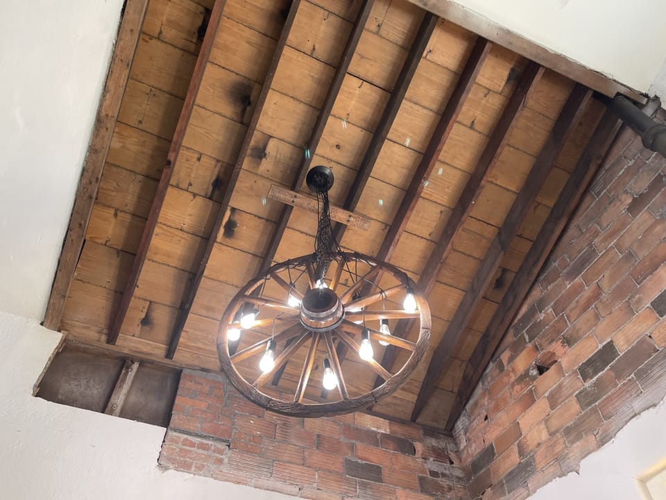 The beautiful wagon light in the entryway.