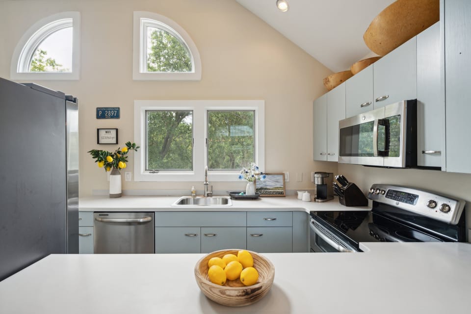 The kitchen has a pass through to the dining area