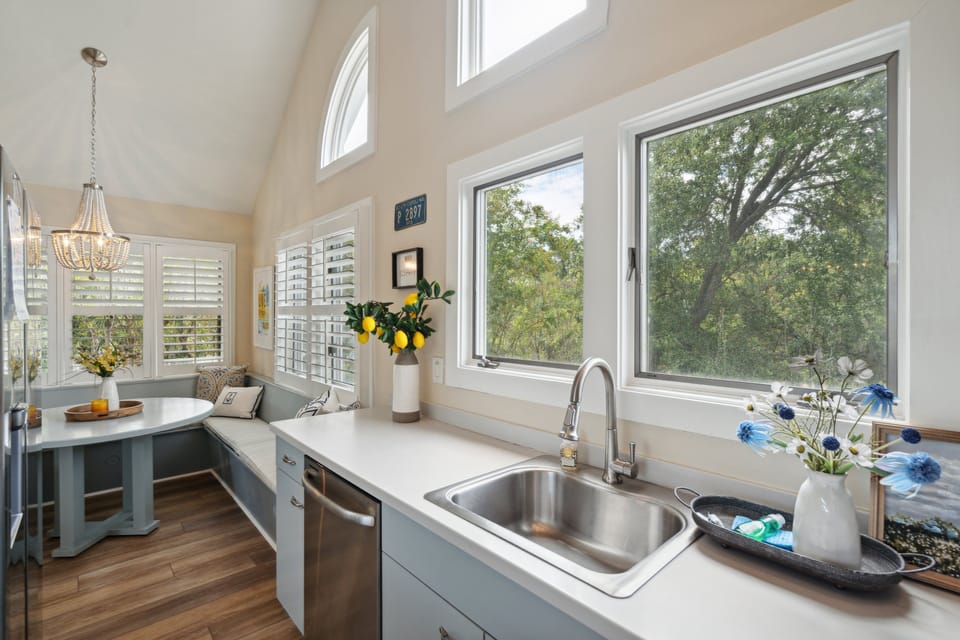 The breakfast table opens onto the kitchen