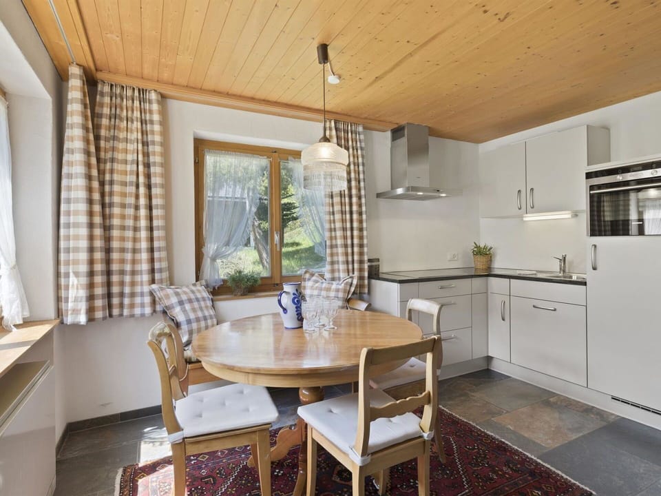Property, Furniture, Cabinetry, Table, Countertop, Chair, Wood, Couch, Kitchen Appliance, Curtain