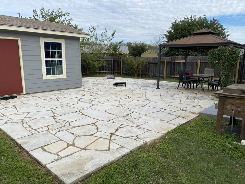 Backyard patio. No access to the studio.
