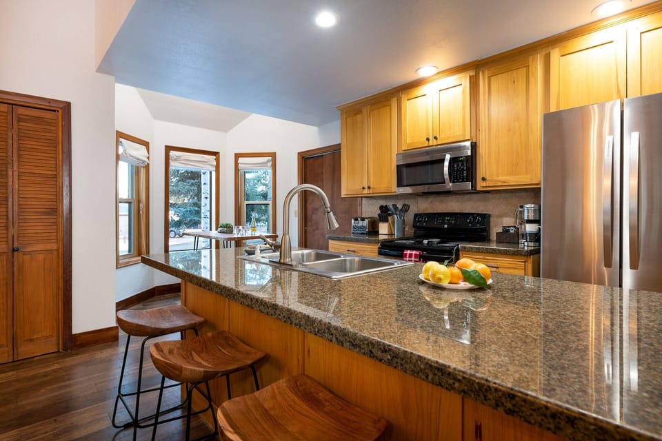 Kitchen overlooking the quiet neighborhood, newly renovated with 5 star guest reviews!