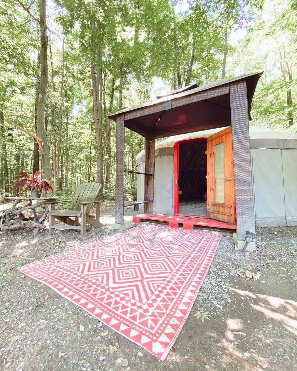 Exterior of Round Mongolian Yurt tent on site. 