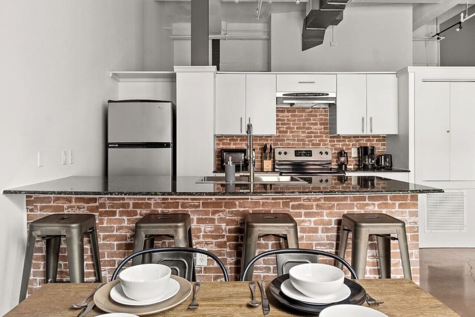 Gather Around the Gorgeous Island in This Modern Kitchen