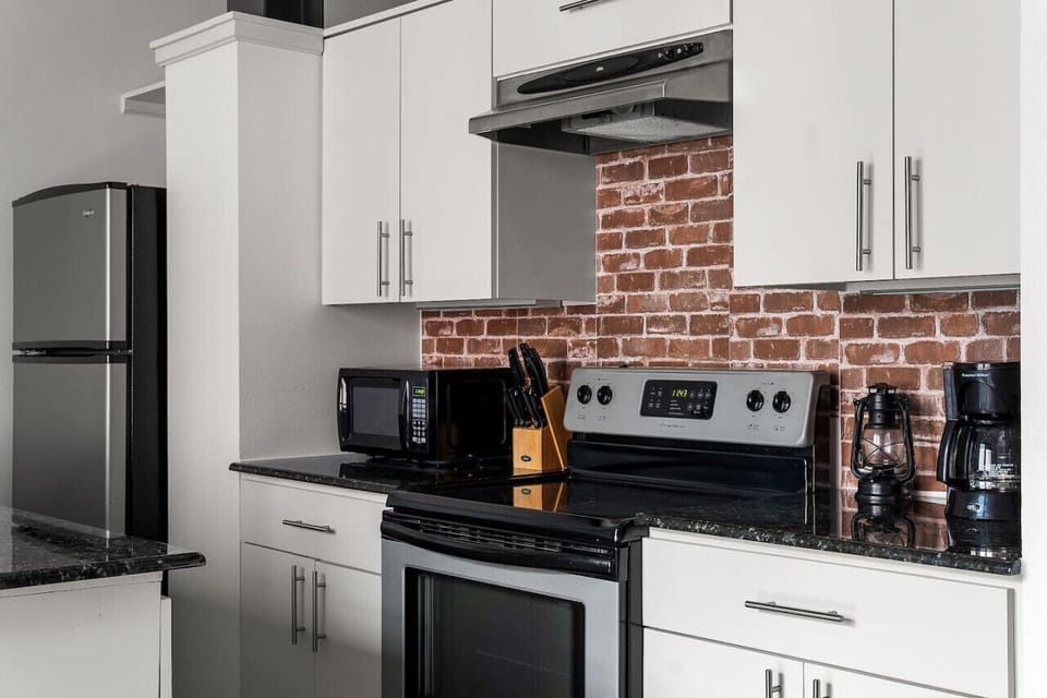 A stylish kitchen with modern appliances for your convenience.