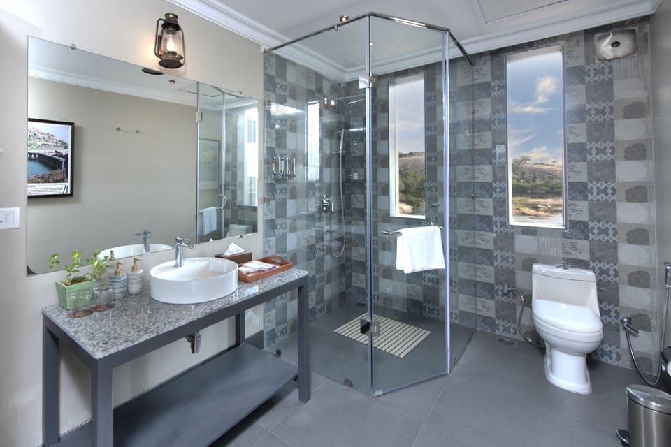 Rainfall showerhead, designer toiletries, hair dryer, bathrobes