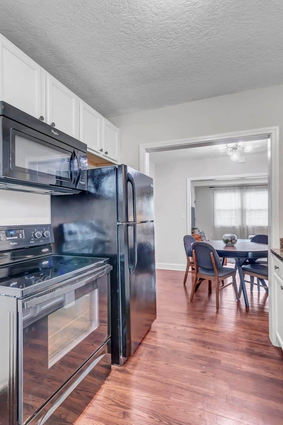 Newly renovated kitchen space with ample cooking utensils for a home-cooked meal.