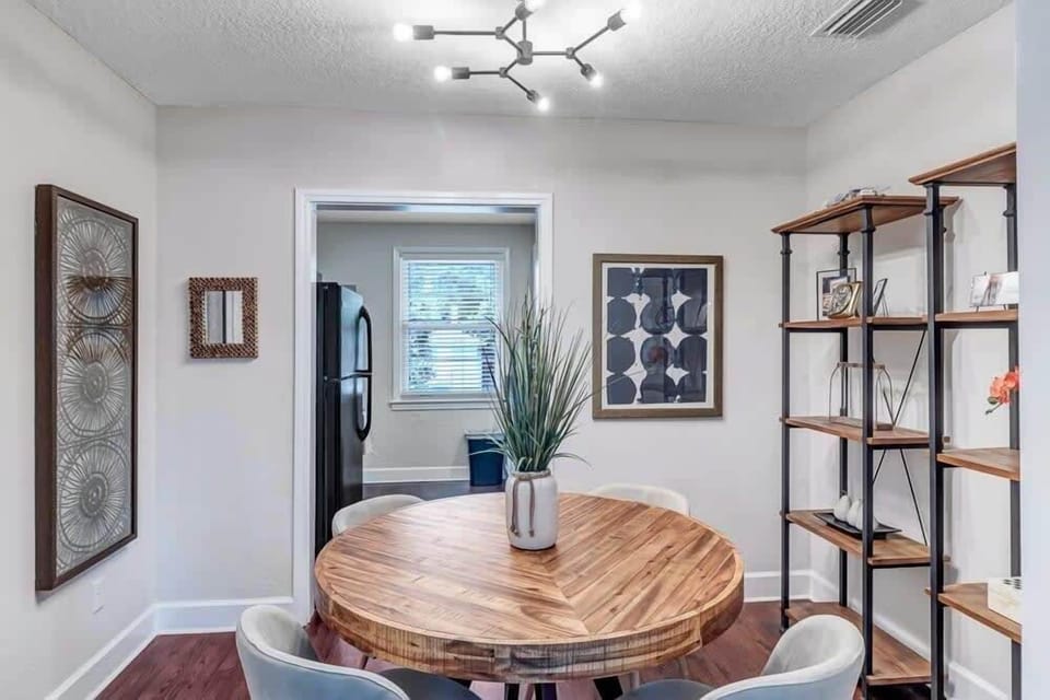 Separate dining space for gathering for meals or working at home.