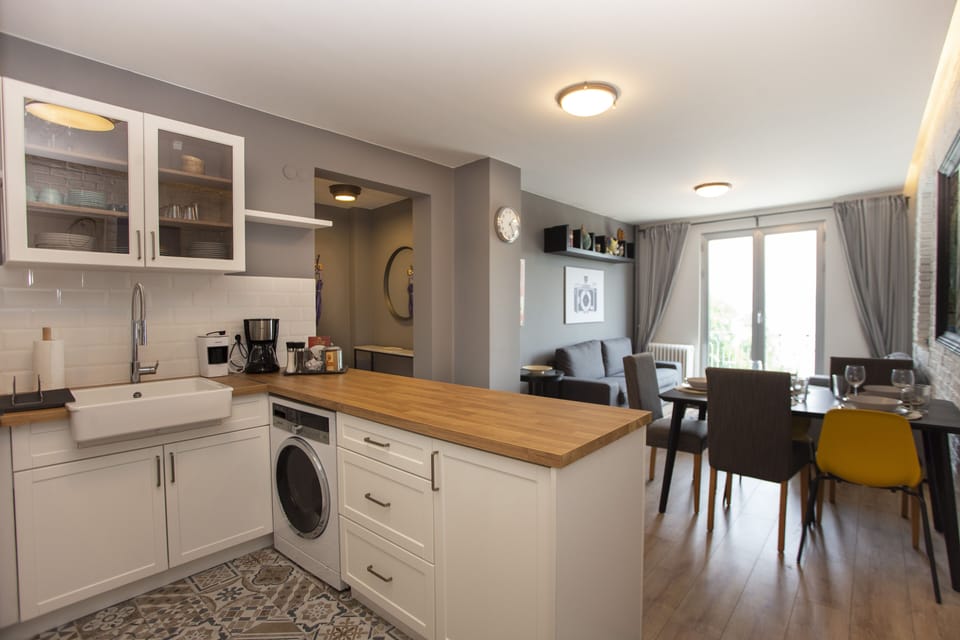 The kitchen, open to the living room