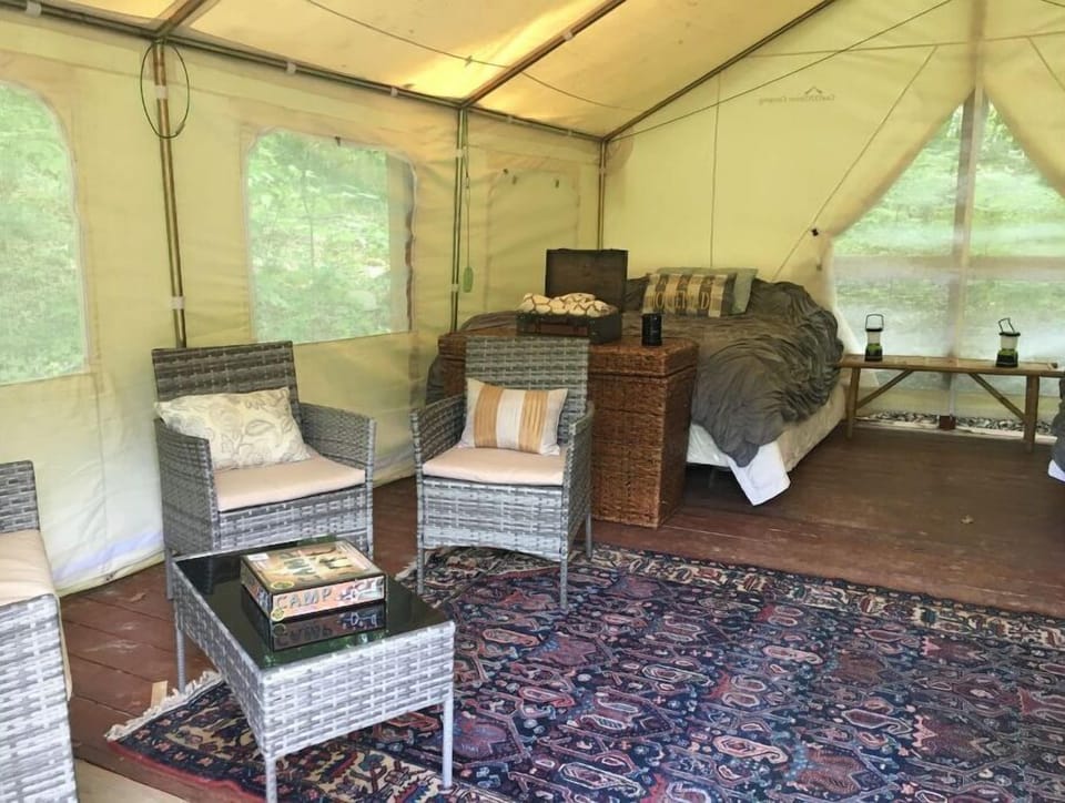 Interior of the Quad Squad. Sitting area and one of the 2 queen beds. 