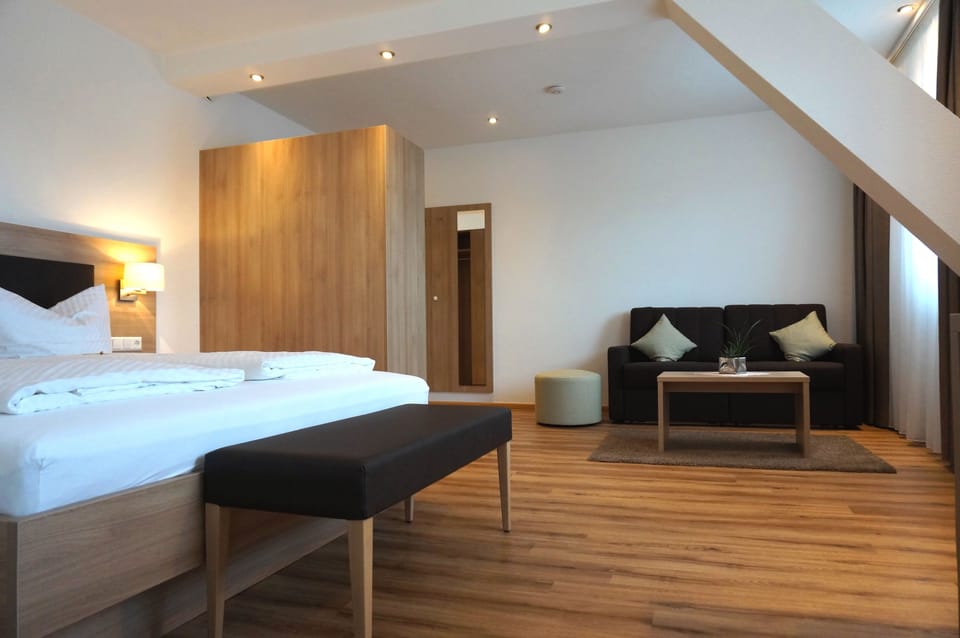 Premium Triple Room, 1 Queen Bed with Sofa bed | In-room safe, individually decorated, desk, cribs/infant beds