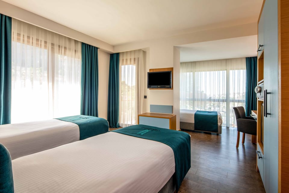 Standard Triple Room | Premium bedding, minibar, in-room safe, individually furnished