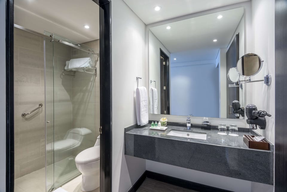 Shower, rainfall showerhead, eco-friendly toiletries, hair dryer