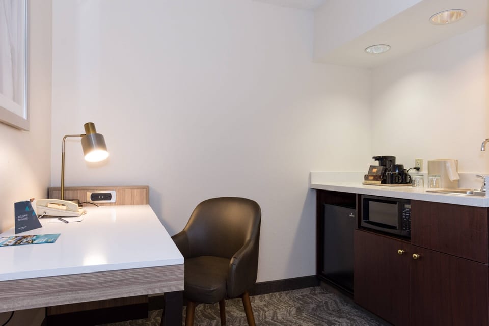Down comforters, pillowtop beds, desk, laptop workspace