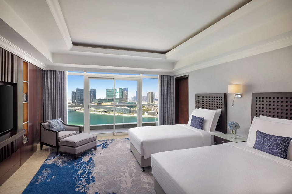 Family Suite, 2 Bedrooms | 1 bedroom, down comforters, minibar, in-room safe