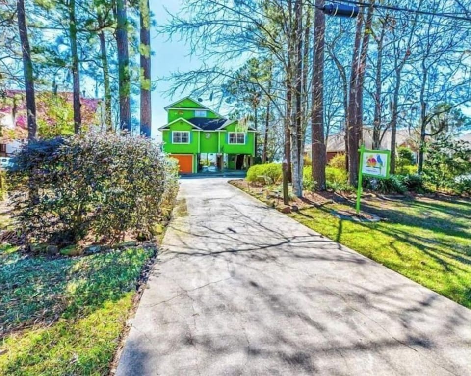 Yes, she is really Lime Green with Orange Garage Doors and Blue Shutters!