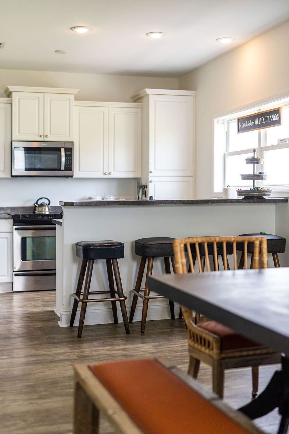 Eat-in kitchen with convenient bar height seating for 4.