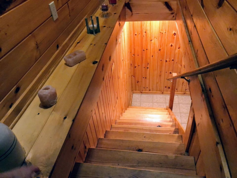 Stairs leading to bedroom and bathroom