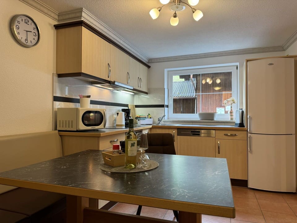 Cabinetry, Property, Countertop, Furniture, Kitchen Appliance, Kitchen Stove, Interior Design, Kitchen, Lighting, Home Appliance