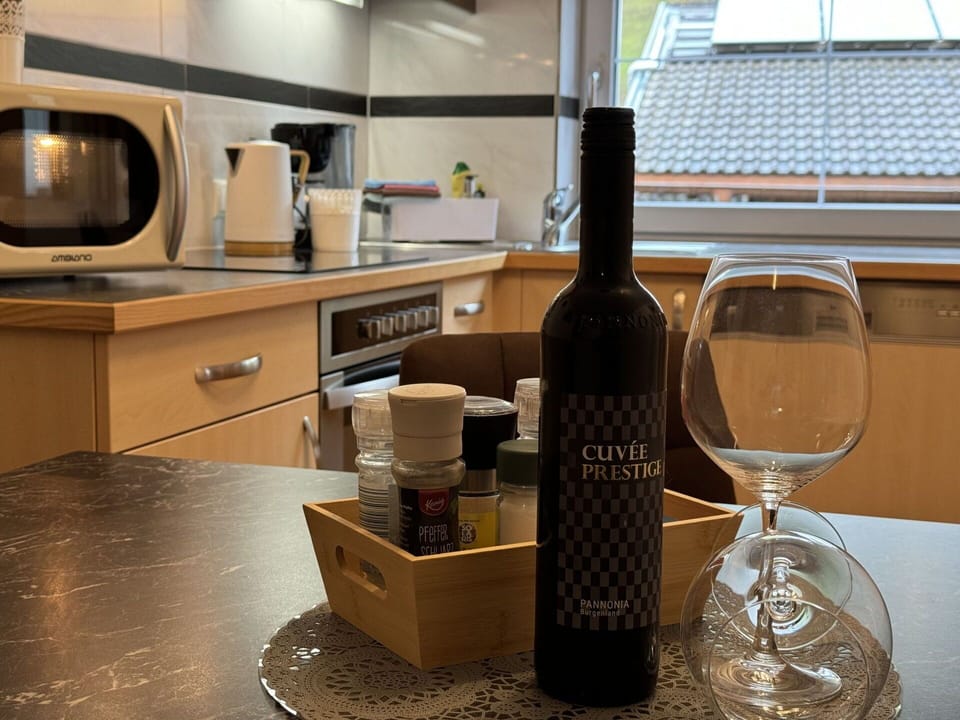 Bottle, Furniture, Drinkware, Cabinetry, Barware, Wine, Tableware, Table, Countertop, Kitchen Appliance