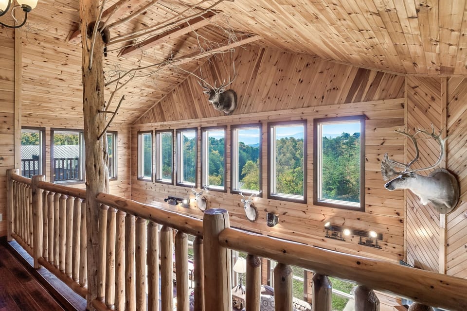 Custom tree in the upper loft bringing the outside in.
