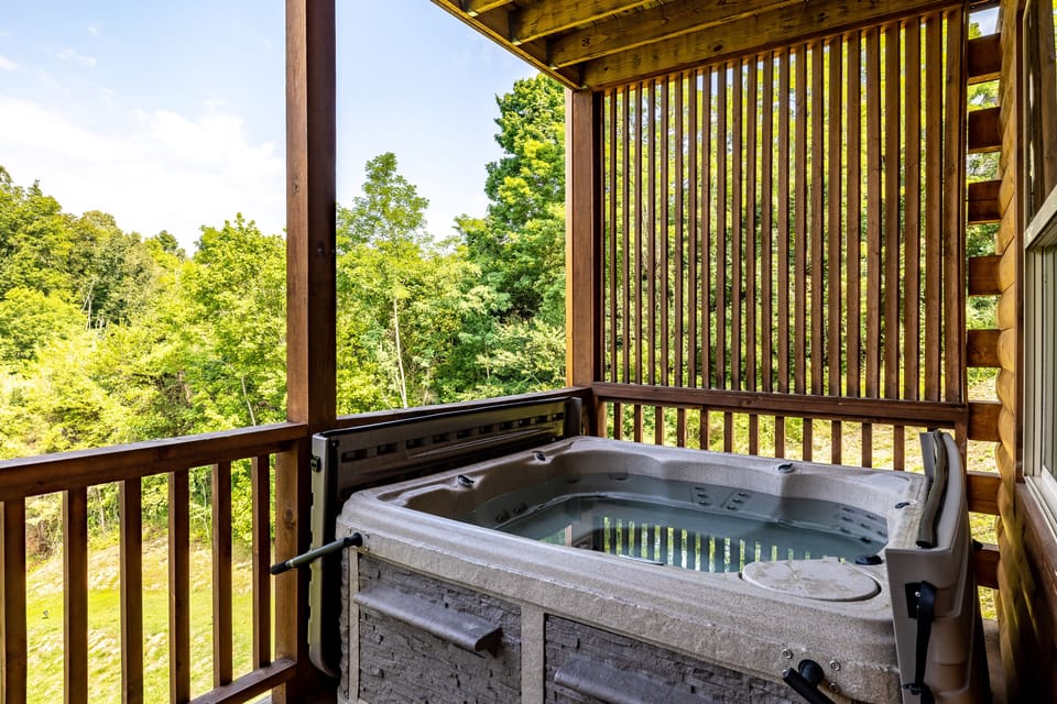 Lower deck hot tub over-looking the private lake 