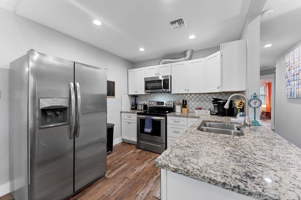 Whip up delicious meals in this fully equipped kitchen, where style meets function and every detail invites you to cook, connect, and savor special moments.