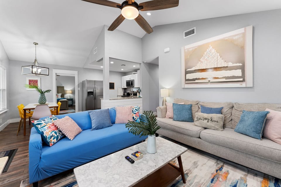 Connect and unwind in this roomy living area—where comfort meets style and togetherness to create memorable experiences for all.