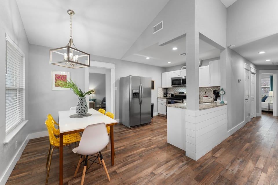 Prepare delicious meals in this spacious and chic kitchen, crafted for both efficiency and modern design to inspire your cooking.