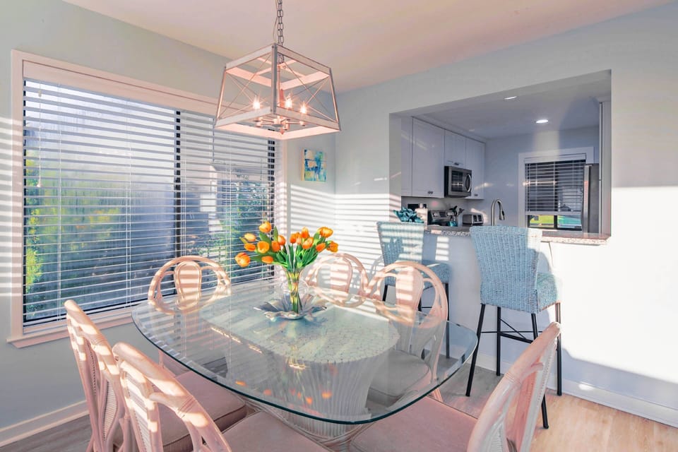It is easy to interact with your guests in the kitchen, dining area and living room.