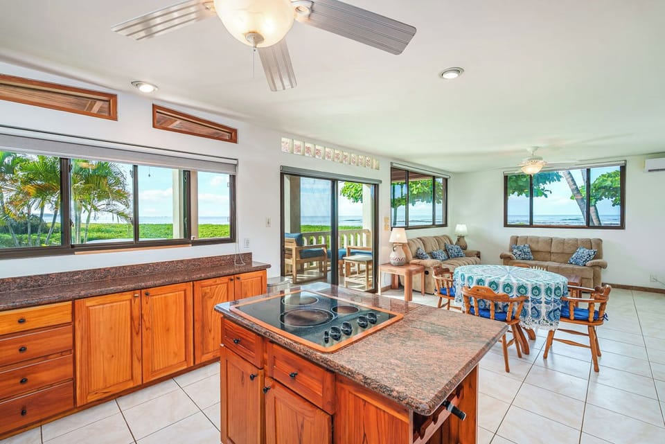 Beautiful views of this tropical paradise from the kitchen and living room.