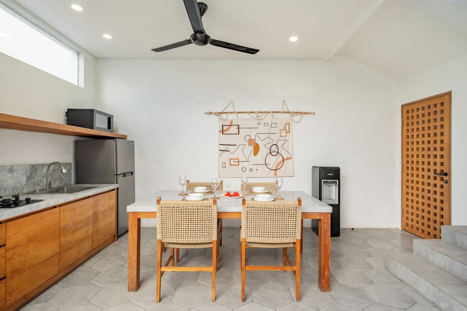 Villa | Private kitchen | Fridge, microwave, stovetop, cookware/dishes/utensils
