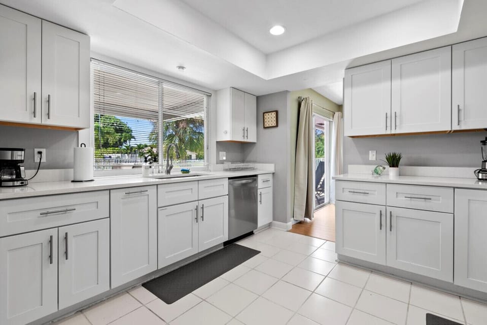 Enjoy cooking in a well-appointed kitchen filled with natural light and backyard views.