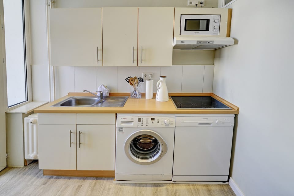 fully equipped, bright kitchen