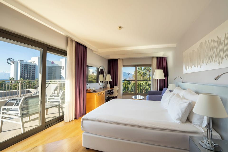 Suite, Balcony, Sea View (V Casual) | Minibar, in-room safe, free cribs/infant beds, free rollaway beds
