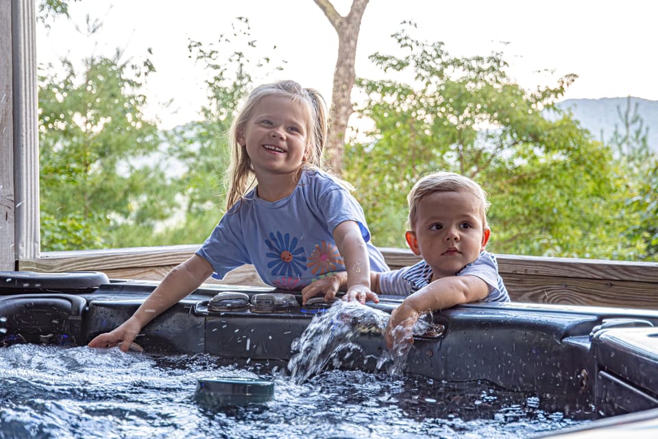 A Outdoor Six-Person Jacuzzi Perfect For Adults and Kids. Emmy and Leo Approve!