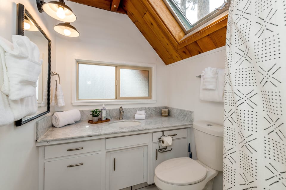 Main floor bathroom with a standing shower