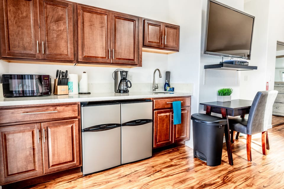 Kitchenette with a cook top, convection oven coffee pot, microwave & more! 