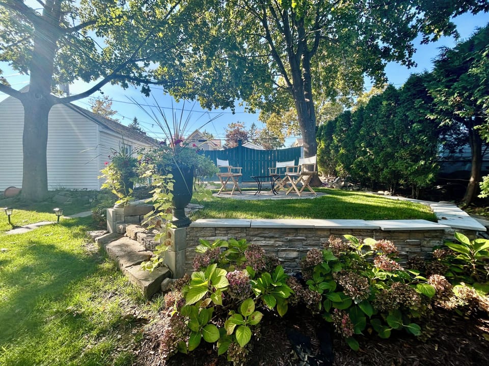 Enjoy our unique, octagonal blue stone patio. Yard is fully shaded by 3pm