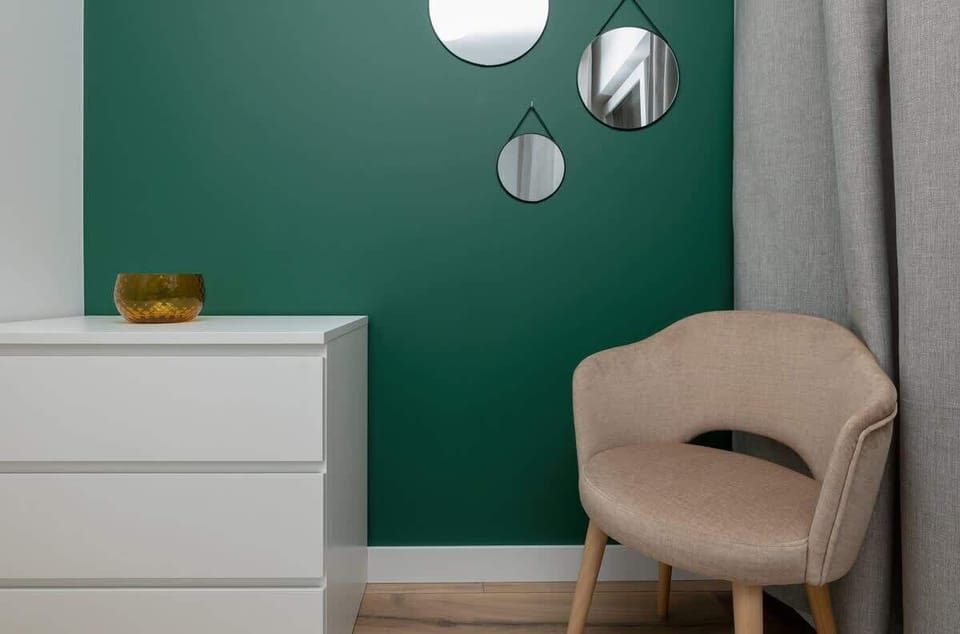 Bedroom corner with a vanity and stylish decor — a perfect spot to get ready for the evening.