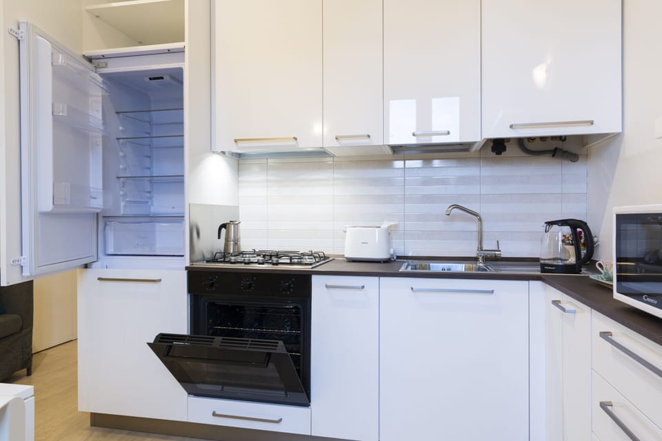 Apartment | Private kitchen | Full-size fridge, microwave, oven, stovetop