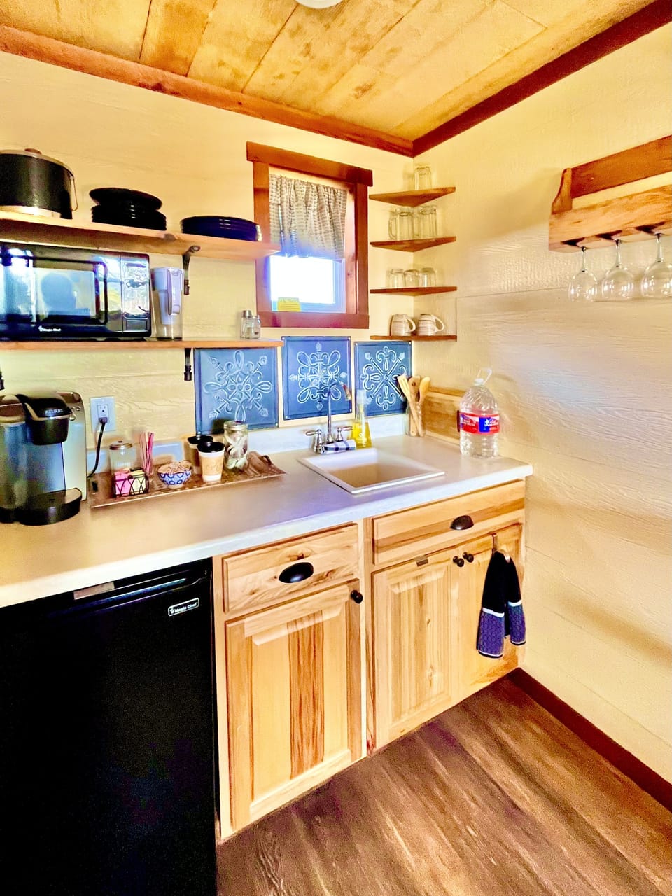 Goodnight's well-appointed kitchenette: stocked Coffee Bar, fridge, microwave