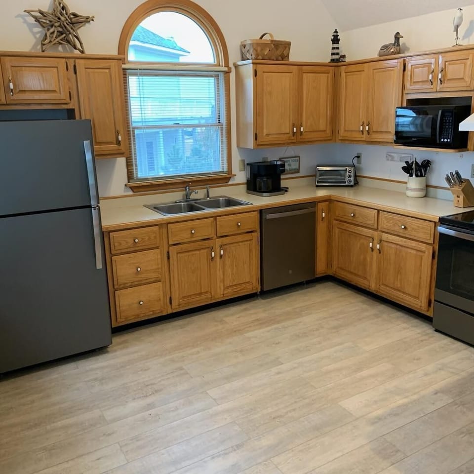 New kitchen appliances and flooring.